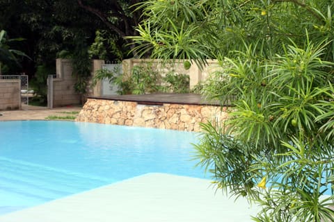 Outdoor pool, open 7 AM to 6 PM, sun loungers