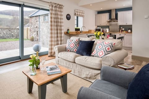 The Barn at Reedsford - sitting room and door to patio