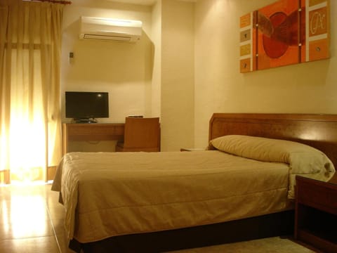 Desk, free WiFi, bed sheets