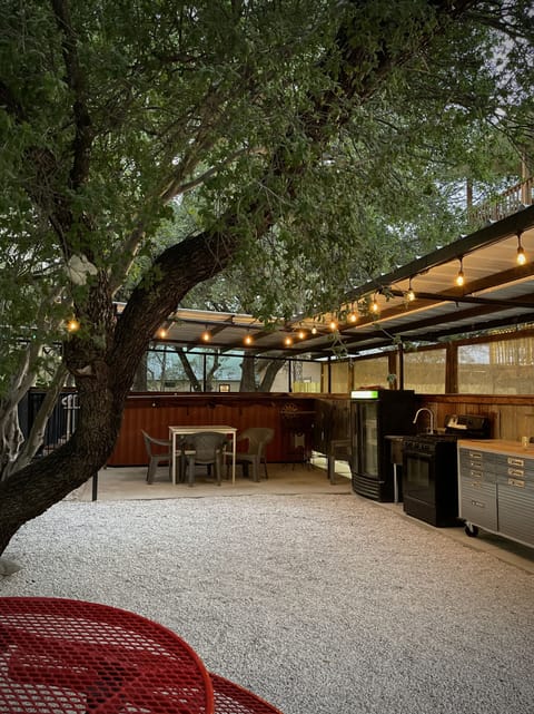 You have an outdoor sink, beverage cooler, oven/stove, grill and smoker pit!