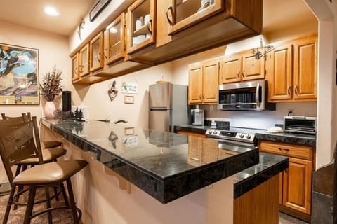 Condo, 2 Bedrooms | Private kitchen | Fridge, oven, coffee/tea maker, toaster