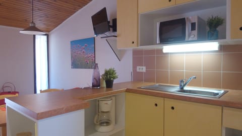 Cottage, 2 Bedrooms (7 Pers) | Private kitchenette | Fridge, microwave, stovetop, dishwasher