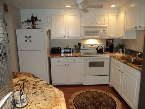 Condo, 2 Bedrooms | Private kitchen | Fridge, microwave, oven, dishwasher