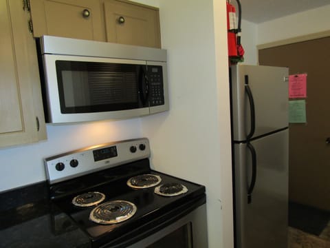 Condo, 1 Bedroom | Private kitchen | Fridge, microwave, oven, dishwasher