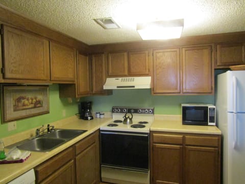 Condo, 2 Bedrooms | Private kitchen | Fridge, microwave, oven, dishwasher