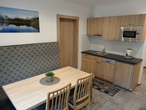 Family Apartment, Multiple Beds | Private kitchenette | Full-size fridge, microwave, stovetop, coffee/tea maker