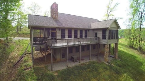 Screened porch and balcony. View of back of Rocky Pine.