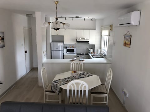 Apartment, 2 Bedrooms, Sea View | Private kitchen | Fridge, microwave, oven, stovetop