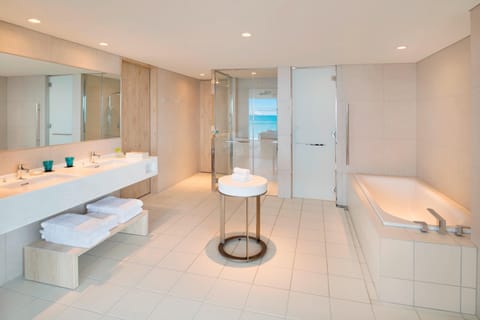 Junior Suite, 2 Double Beds | Bathroom | Separate tub and shower, rainfall showerhead, free toiletries