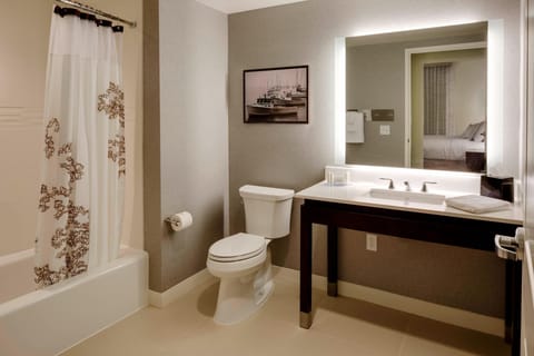 Suite, 1 Bedroom | Bathroom | Separate tub and shower, hair dryer, towels