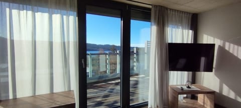 SKY APARTMENT with 1 bedroom, terrace, infrared sauna and lake view | In-room safe, desk, blackout drapes, soundproofing