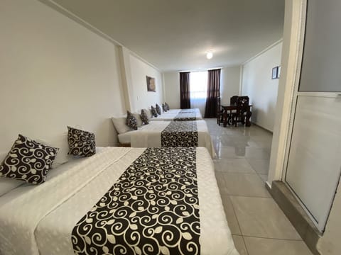 Basic Quadruple Room | Iron/ironing board, free WiFi, bed sheets