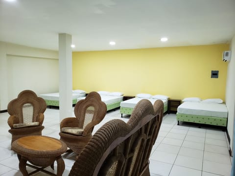 Basic Quadruple Room, Multiple Beds, Private Bathroom, Courtyard Area | Air conditioning