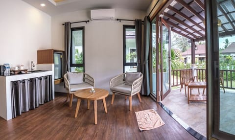 Deluxe Villa, 2 Bedrooms | Living area | TV