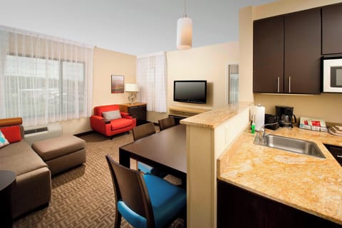 Suite, 2 Bedrooms | Desk, blackout drapes, iron/ironing board, free cribs/infant beds