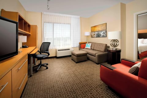 Suite, 1 Bedroom | Living area | 32-inch LCD TV with satellite channels, TV, iPod dock