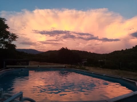 Seasonal outdoor pool, pool umbrellas, sun loungers