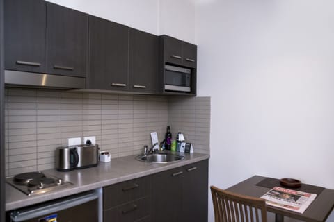 Studio Apartment | Private kitchenette | Microwave, stovetop, coffee/tea maker, electric kettle