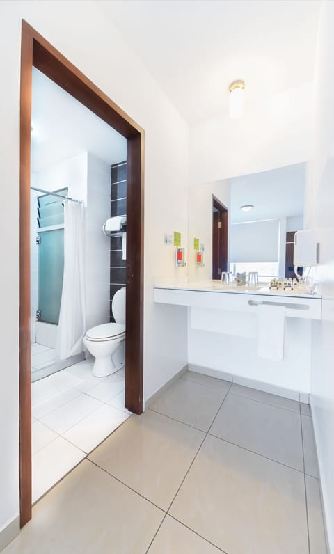 Standard Room, 1 Queen Bed | Bathroom | Shower, free toiletries, hair dryer, bathrobes