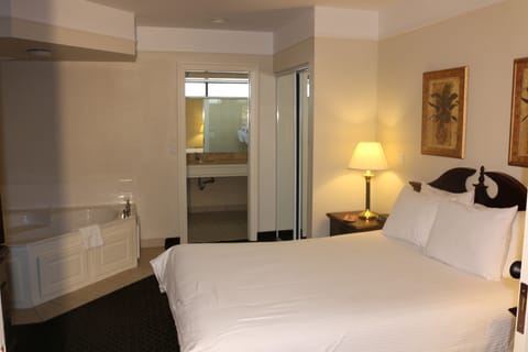 Suite, 1 Queen Bed, Non Smoking | Desk, iron/ironing board, cribs/infant beds, rollaway beds