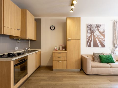 Cabinetry, Property, Sink, Countertop, Wood, Lighting, Drawer, Interior Design, Architecture, Floor