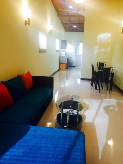 2-Bedroom Apartment | Living area | Flat-screen TV