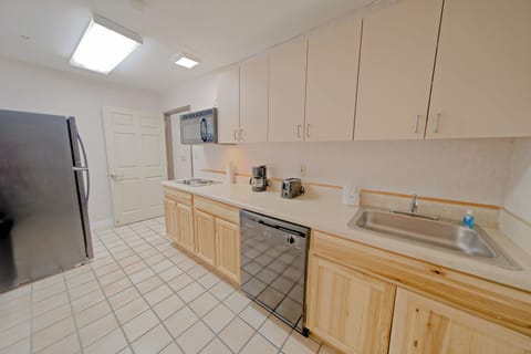 Suite, 1 Bedroom, Jetted Tub | Private kitchen | Full-size fridge, microwave, stovetop, dishwasher