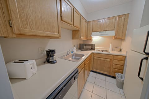 Suite, 1 Bedroom | Private kitchen | Full-size fridge, microwave, stovetop, dishwasher