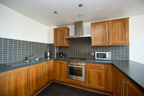 Apartment, 2 Bedrooms | Private kitchen | Fridge, microwave, stovetop, dishwasher