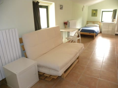 Quadruple Room, 2 Bathrooms | Iron/ironing board, free WiFi, bed sheets