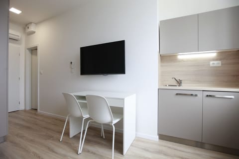 Apartment | Private kitchenette | Fridge, stovetop, electric kettle, toaster