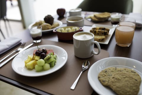 Daily buffet breakfast (USD 12 per person)