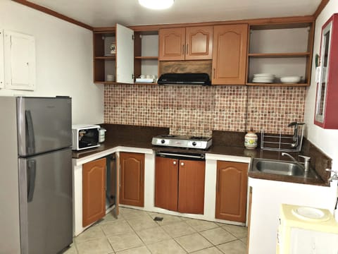 Villa Monte | Private kitchenette | Full-size fridge, microwave, stovetop, electric kettle