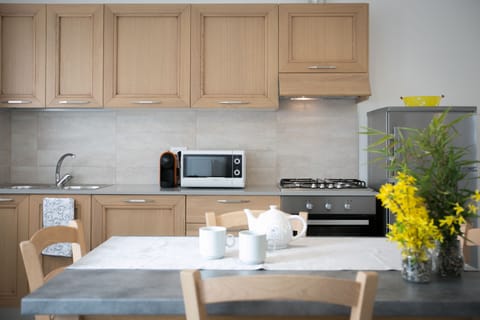 Apartment, 2 Bedrooms, Accessible, Garden View | Private kitchen | Full-size fridge, stovetop, espresso maker, coffee/tea maker