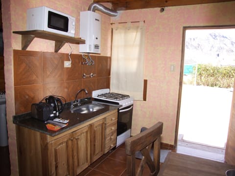 Standard Cabin | Private kitchen | Fridge, microwave, stovetop, coffee/tea maker