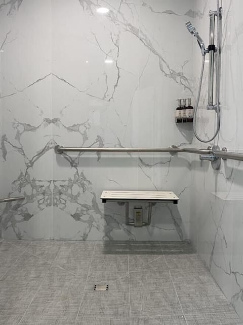 1 Queen Bed, Accessible (Budget) No Pets | Bathroom | Shower, designer toiletries, hair dryer, towels