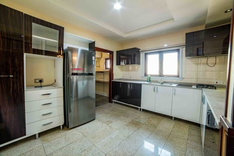 Suite, 2 Bedrooms | Private kitchen | Mini-fridge, coffee/tea maker, electric kettle