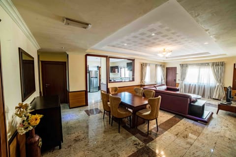 Suite, 2 Bedrooms | Living area | 42-inch LED TV with digital channels, TV