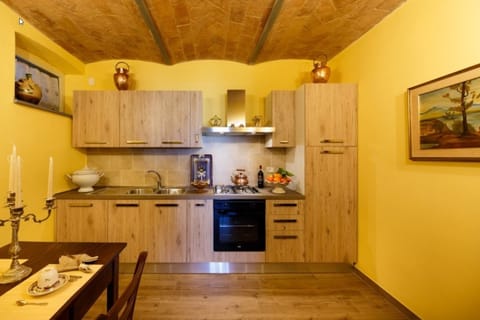 Apartment, 2 Bedrooms (La Stalla) | Private kitchen | Full-size fridge, microwave, oven, stovetop