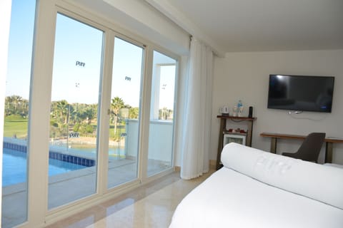 Suite (Golf Pool suite, with private pool) | 1 bedroom, minibar, in-room safe, individually decorated