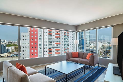 Suite, 1 King Bed, City View, Corner | 1 bedroom, hypo-allergenic bedding, minibar, in-room safe