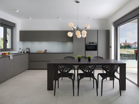 Room, Furniture, Dining Room, Property, Interior Design, Kitchen, Building, Table, Countertop, Cabinetry