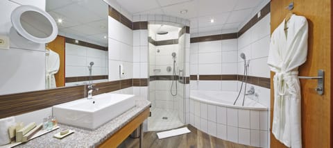 Suite, Garden View (Single Use) | Bathroom | Shower, free toiletries, hair dryer, slippers