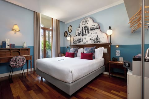 Premium bedding, down comforters, pillowtop beds, minibar