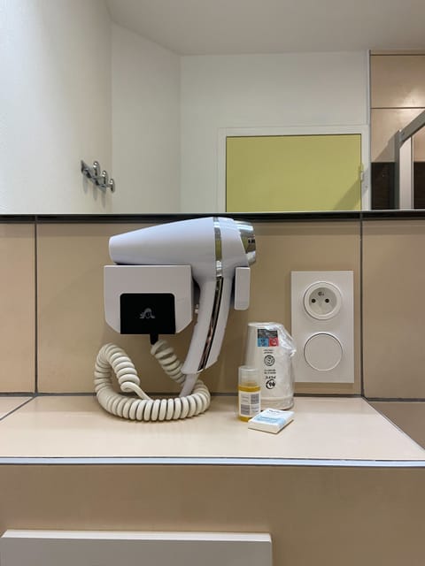 Shower, free toiletries, hair dryer, soap