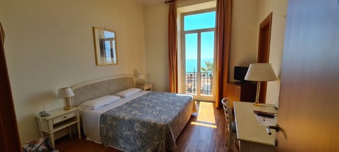 Superior Double Room, Sea View | Minibar, in-room safe, individually decorated, desk