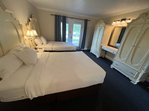 Suite, 2 Double Beds | 1 bedroom, desk, blackout drapes, iron/ironing board