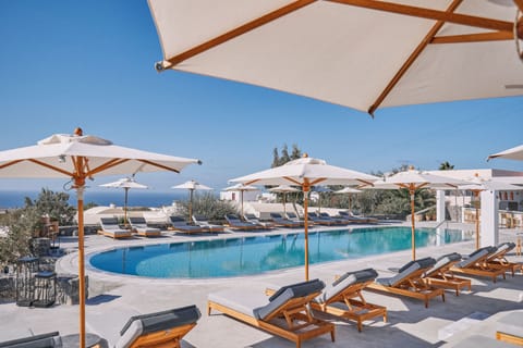 2 outdoor pools, pool umbrellas, sun loungers