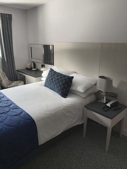 Premium bedding, minibar, desk, laptop workspace