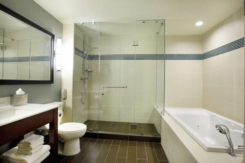 Suite, 1 King Bed, Partial Ocean View (Manoa, Deck) | Bathroom | Designer toiletries, hair dryer, towels, soap